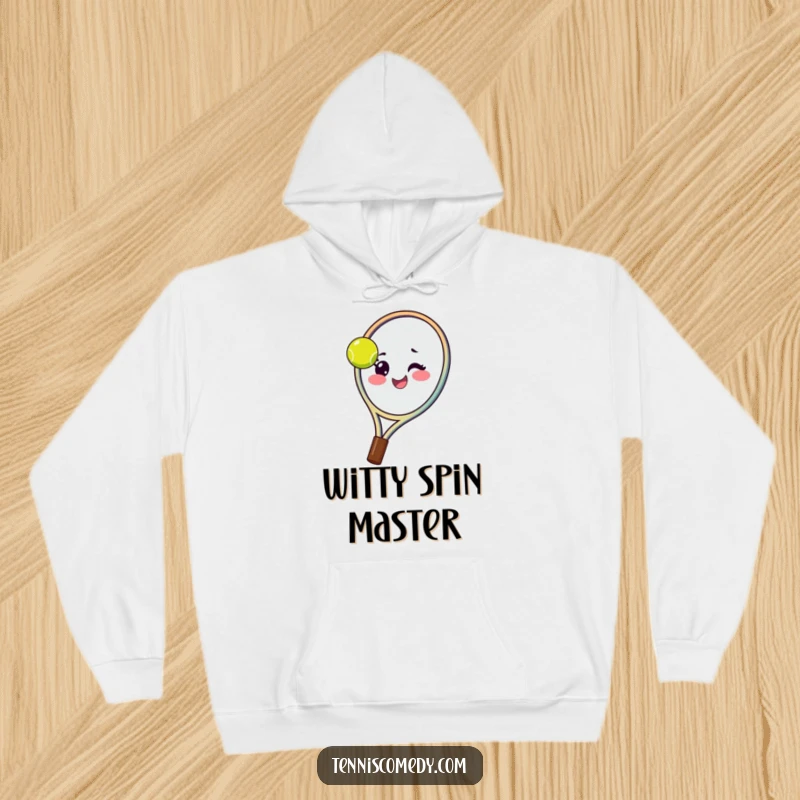 Funny tennis racket hoodie featuring a happy racket spinning a ball on its strings with a wink, perfect for cozying up.